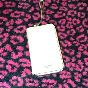 kate spade cream zip-around wristlet wallet with gold trim